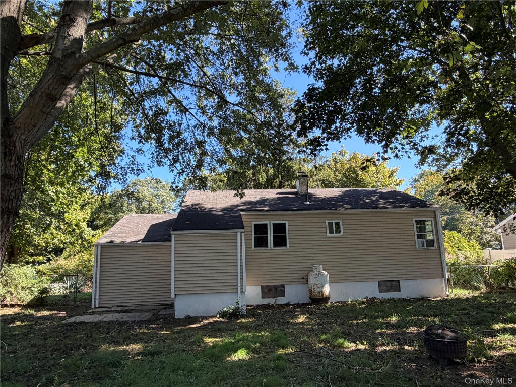 Photo of 748 Doane Avenue, Bellport, NY 11713 (MLS # 1060652)