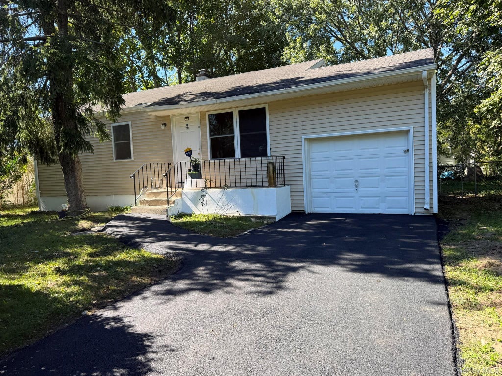 Photo of 748 Doane Avenue, Bellport, NY 11713 (MLS # 1060652)