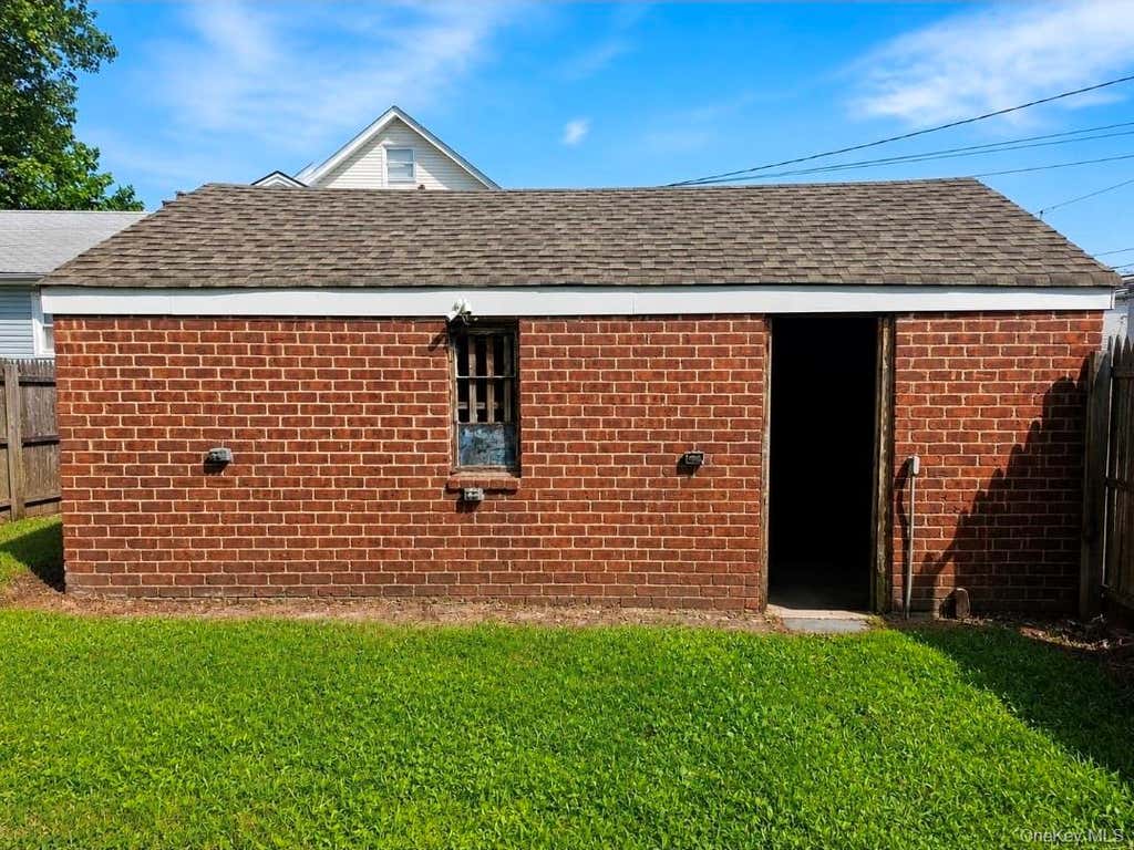 Photo of 509 Cedarhurst Avenue, Cedarhurst, NY 11516 (MLS # 1035996)