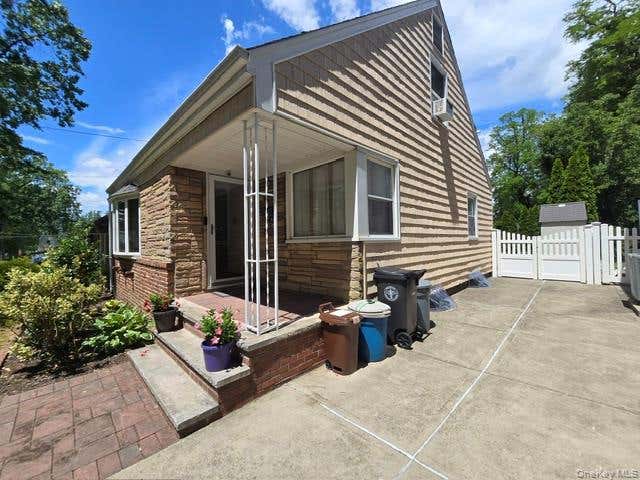 Photo of 24841 Thebes Avenue, Little Neck, NY 11362 (MLS # 1010293)