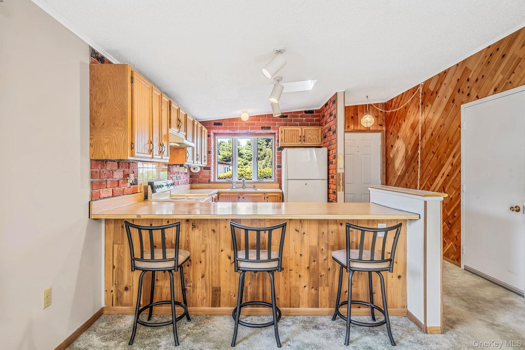 Photo of 17 Dogwood Lane, Manorville, NY 11949 (MLS # 1044125)