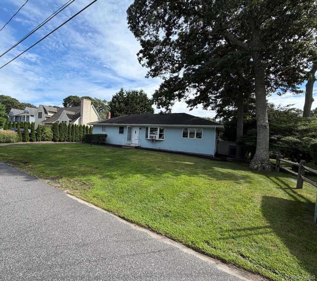 Photo of 22 Maryland Boulevard, Hampton Bays, NY 11946 (MLS # 1042756)