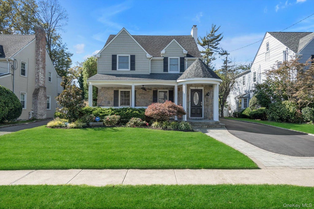 Photo of 53 Murdock Road, East Rockaway, NY 11563 (MLS # 1064088)