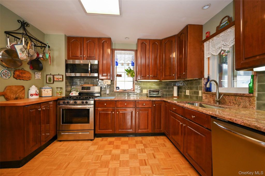 Photo of 7136 Loubet Street, Forest Hills, NY 11375 (MLS # 932882)