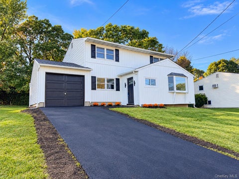 Photo of 18 Willow Street, Selden, NY 11784 (MLS # 1064868)