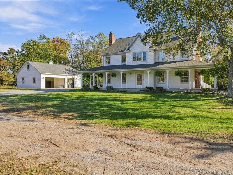 Photo of 70 Woodlawn Avenue, East Moriches, NY 11940 (MLS # 1068361)