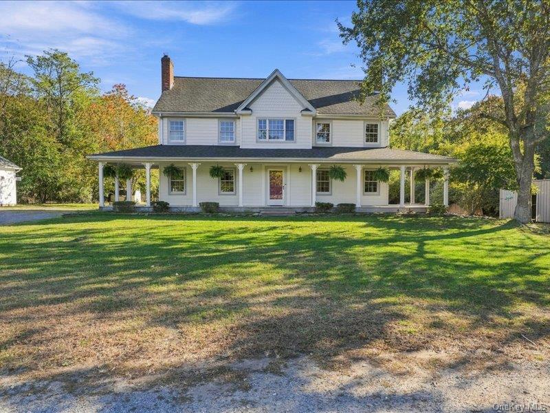 Photo of 70 Woodlawn Avenue, East Moriches, NY 11940 (MLS # 1068361)
