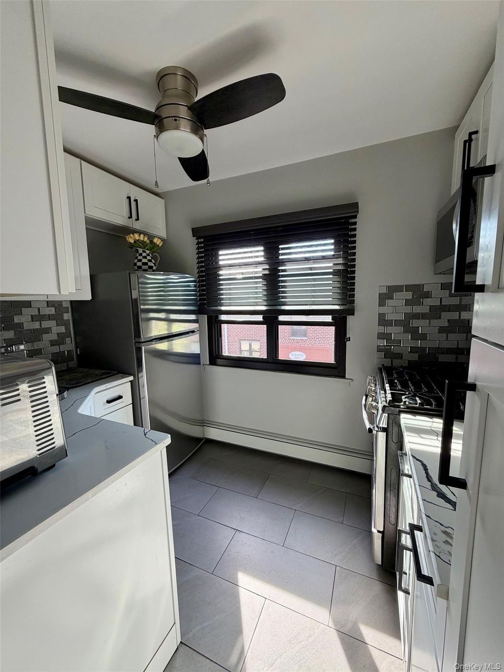Photo of 55 Tulip Avenue #B5-5, Floral Park, NY 11001 (MLS # 1001353)