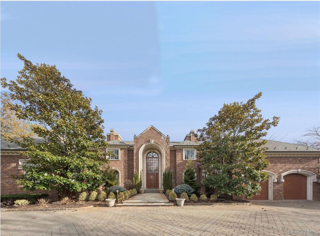 Photo of 22 Willow Road, Woodsburgh, NY 11598 (MLS # 943102)