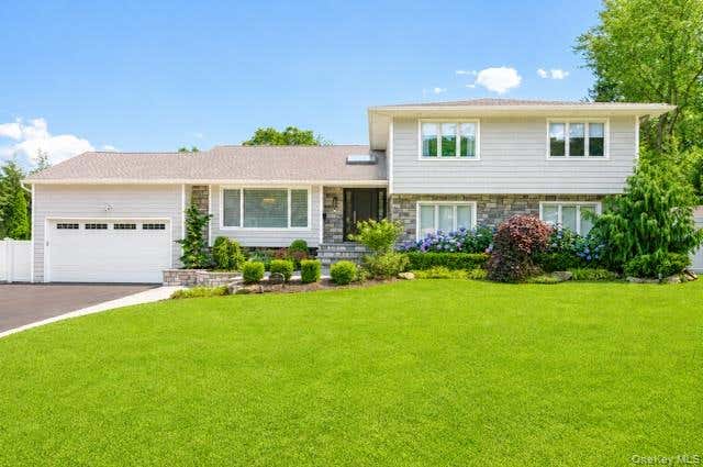 Photo of 15 Pound Ridge Road, Plainview, NY 11803 (MLS # 1025938)