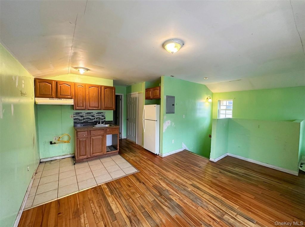 Photo of 174-53 128th Avenue, Jamaica, NY 11434 (MLS # 951978)