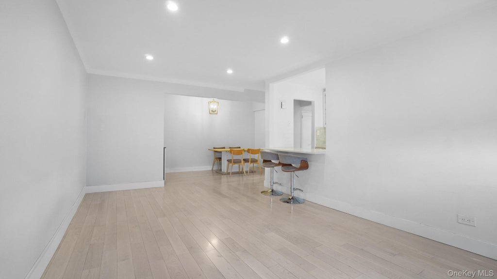 Photo of 66-15 Wetherole St St #E4, Rego Park, NY 11374 (MLS # 1047897)