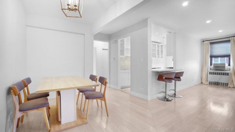 Photo of 66-15 Wetherole St St #E4, Rego Park, NY 11374 (MLS # 1047897)