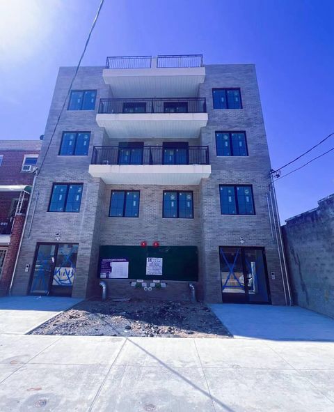 Photo of 58-14 Granger St St, Corona, NY 11368 (MLS # 882694)
