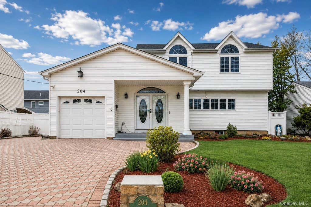 Photo of 204 Broadway, Massapequa Park, NY 11762 (MLS # 1041825)