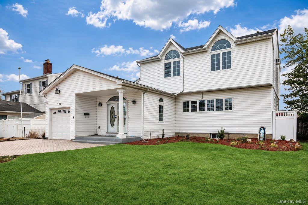 Photo of 204 Broadway, Massapequa Park, NY 11762 (MLS # 1041825)