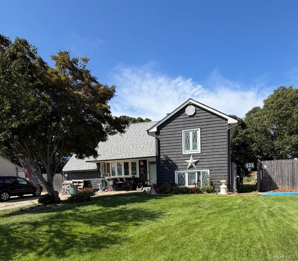 Photo of 31 Garden Lane, Centereach, NY 11720 (MLS # 1050380)