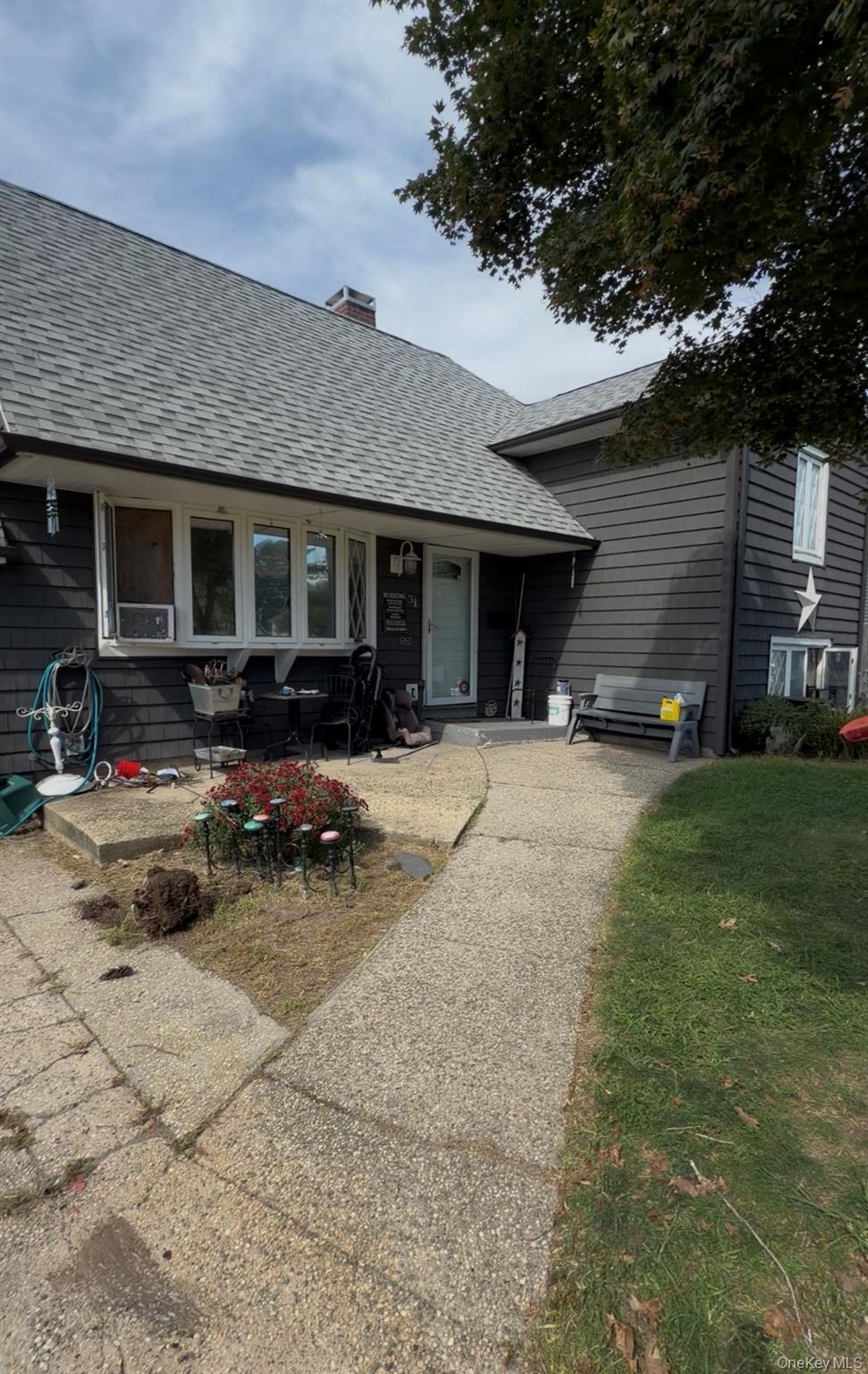 Photo of 31 Garden Lane, Centereach, NY 11720 (MLS # 1050380)