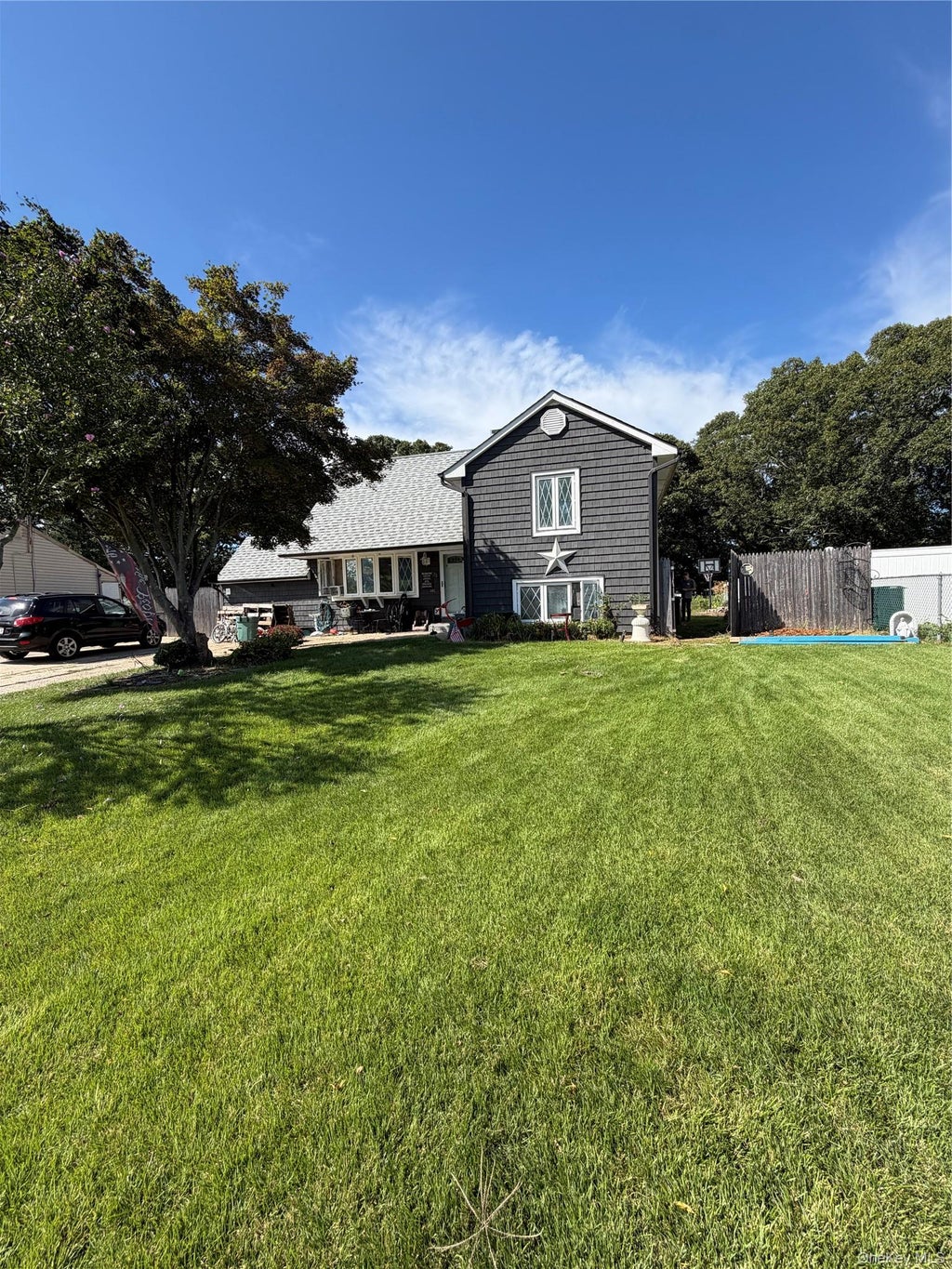 Photo of 31 Garden Lane, Centereach, NY 11720 (MLS # 1050380)