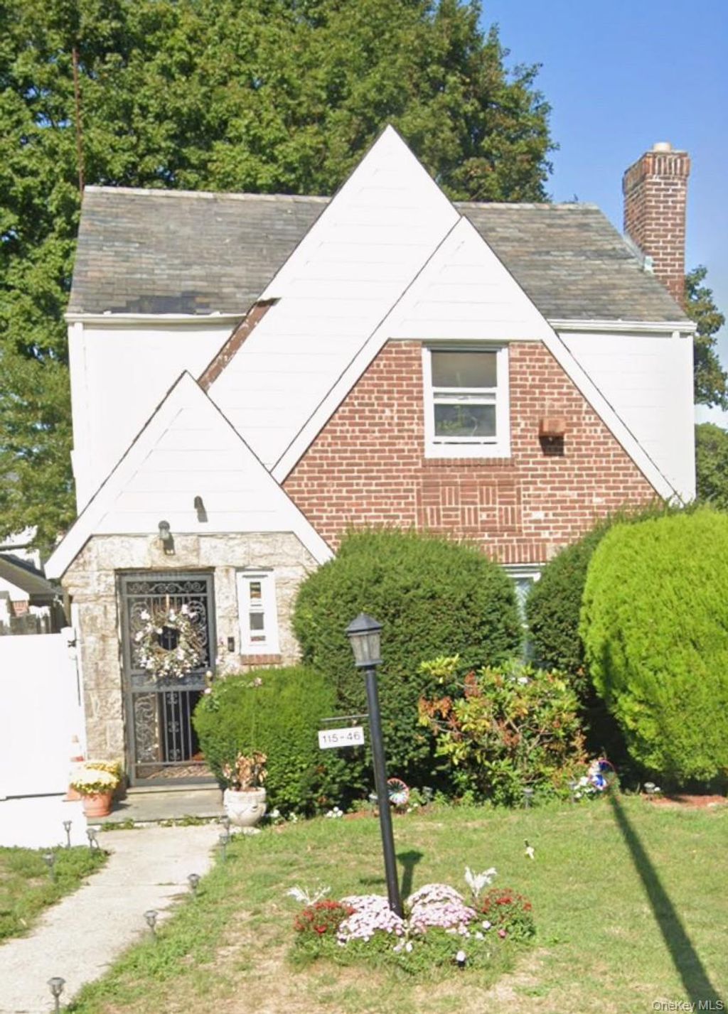 Photo of 11546 220th Street, Cambria Heights, NY 11411 (MLS # 939425)