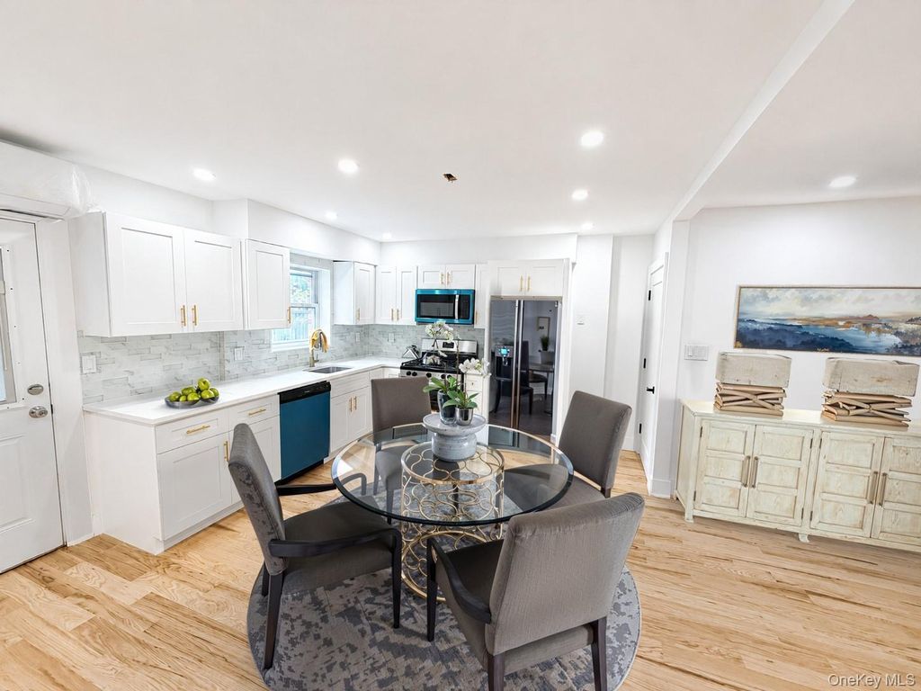 Photo of 1061 E 218th Street, Bronx, NY 10469 (MLS # 1000483)