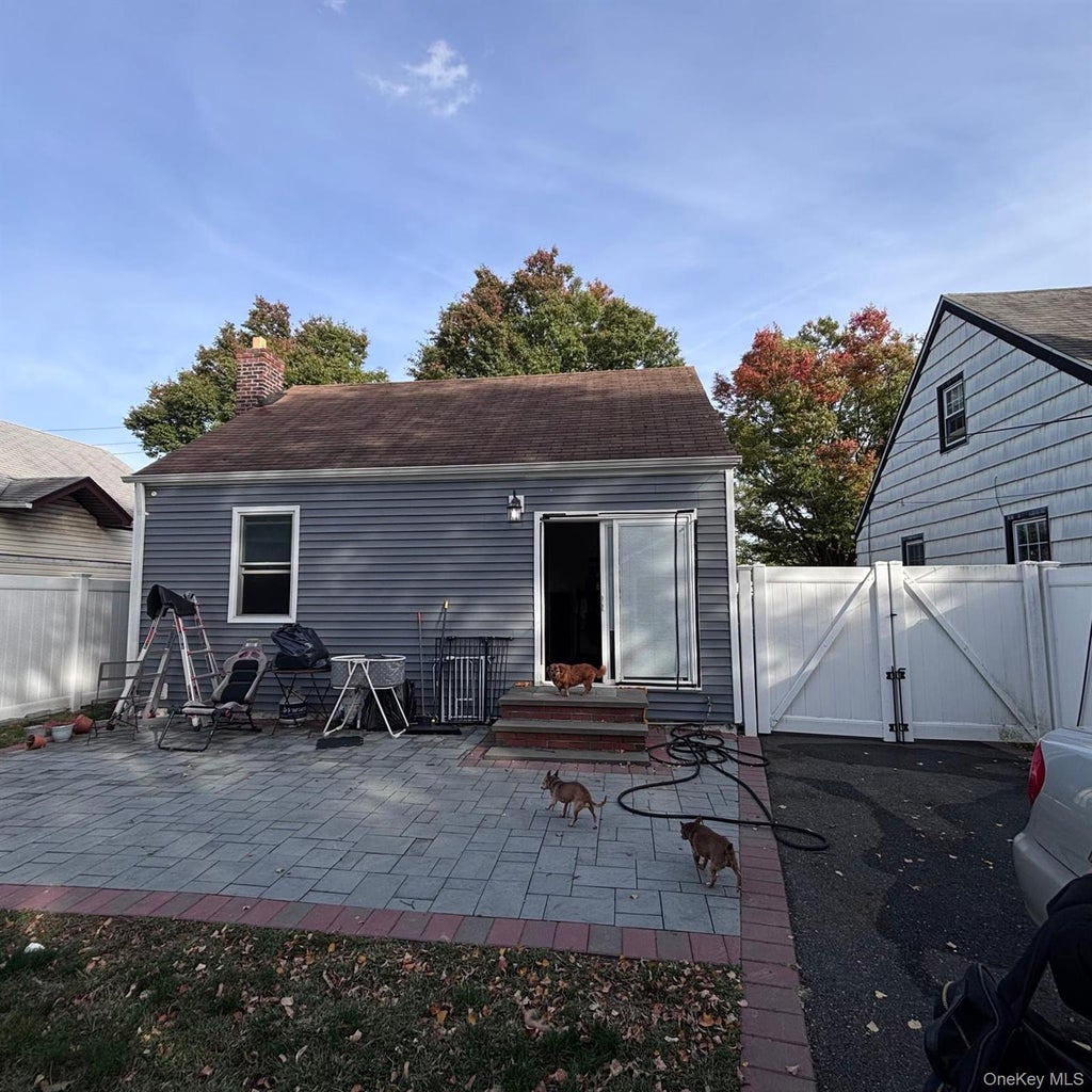 Photo of 11840 236th Street, Cambria Heights, NY 11411 (MLS # 1068072)