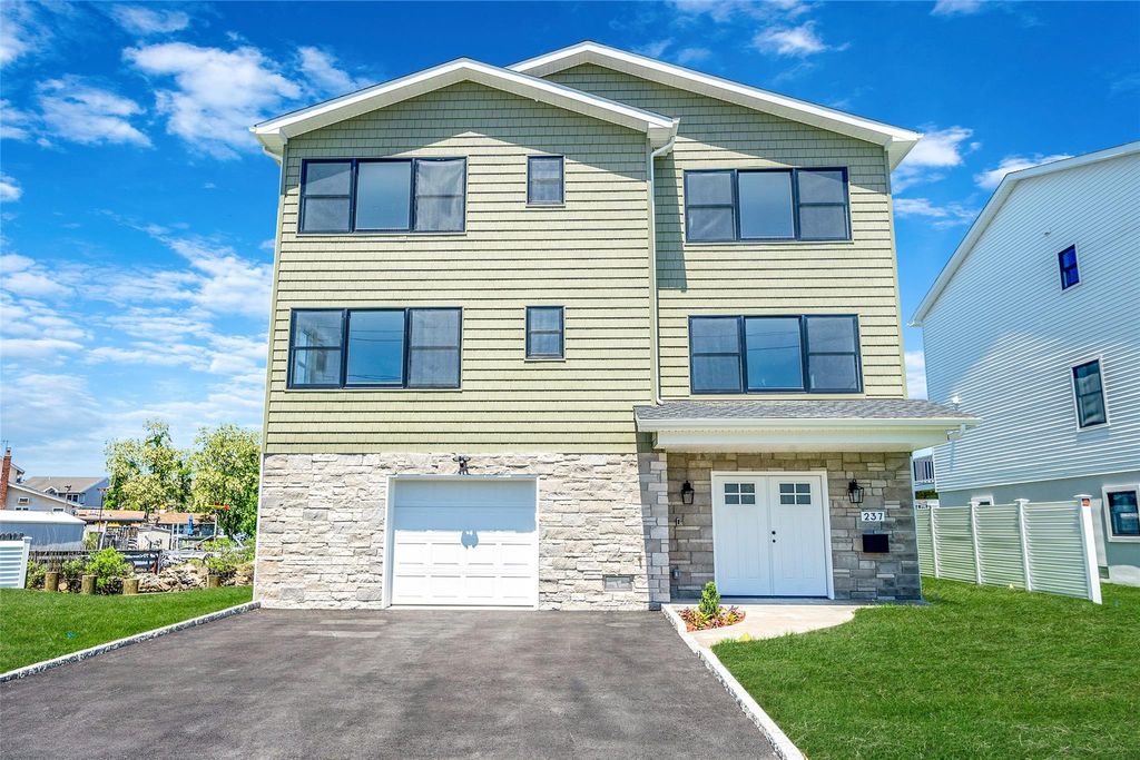 Photo of 237 Mott Street, Oceanside, NY 11572 (MLS # 864790)