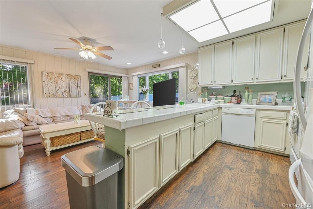 Photo of 38 Glenmere Lane, Coram, NY 11727 (MLS # 978262)