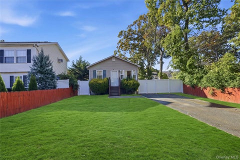 Photo of 94 Commonwealth Drive, Wyandanch, NY 11798 (MLS # 1066405)