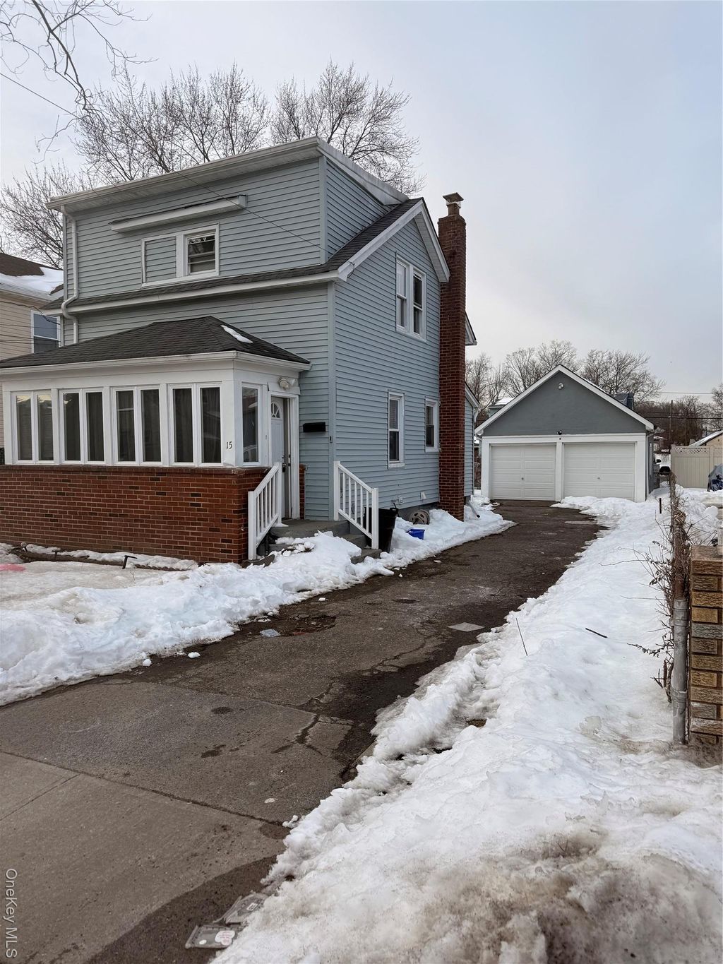 Photo of 15 Mirin Avenue, Roosevelt, NY 11575 (MLS # 959465)