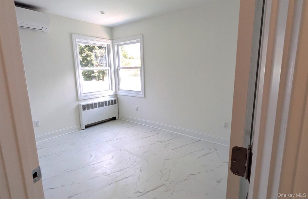 Photo of 11 Wood Street, Lynbrook, NY 11563 (MLS # 1047701)