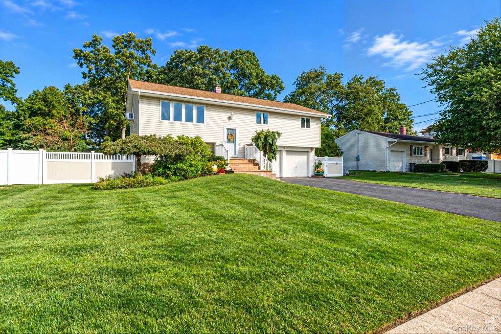 Photo of 251 Manhasset Street, Islip Terrace, NY 11752 (MLS # 1062034)
