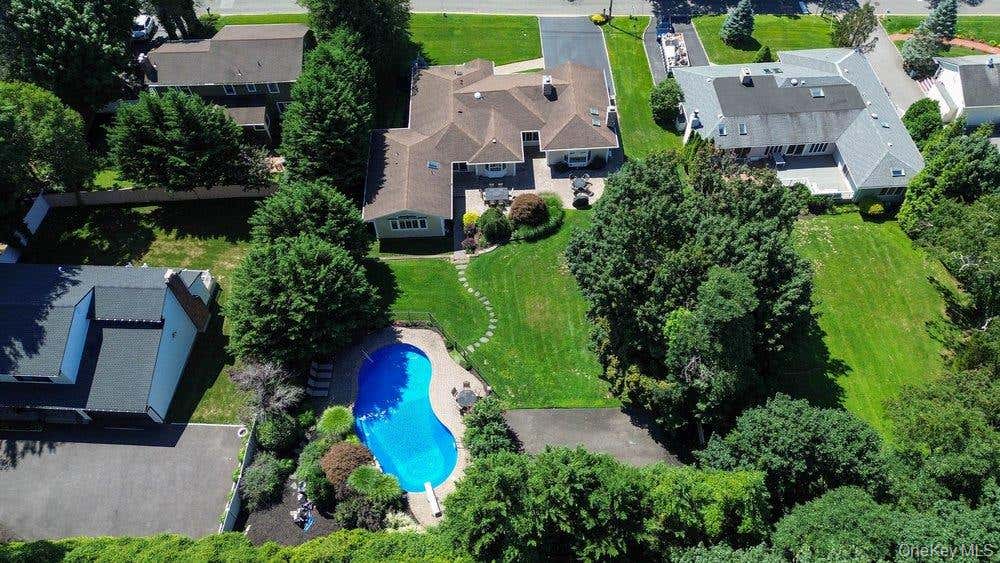Photo of 14 Hickman Street, Syosset, NY 11791 (MLS # 1036679)