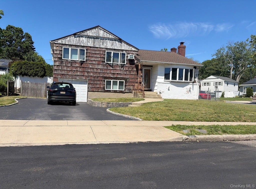 Photo of 524 Pontiac Road, East Meadow, NY 11554 (MLS # 1064520)