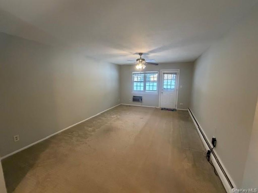 Photo of 12 Harbour Lane #4A, Oyster Bay, NY 11771 (MLS # 963700)