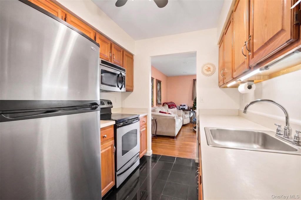 Photo of 78 Cambridge Drive W, Copiague, NY 11726 (MLS # 913978)