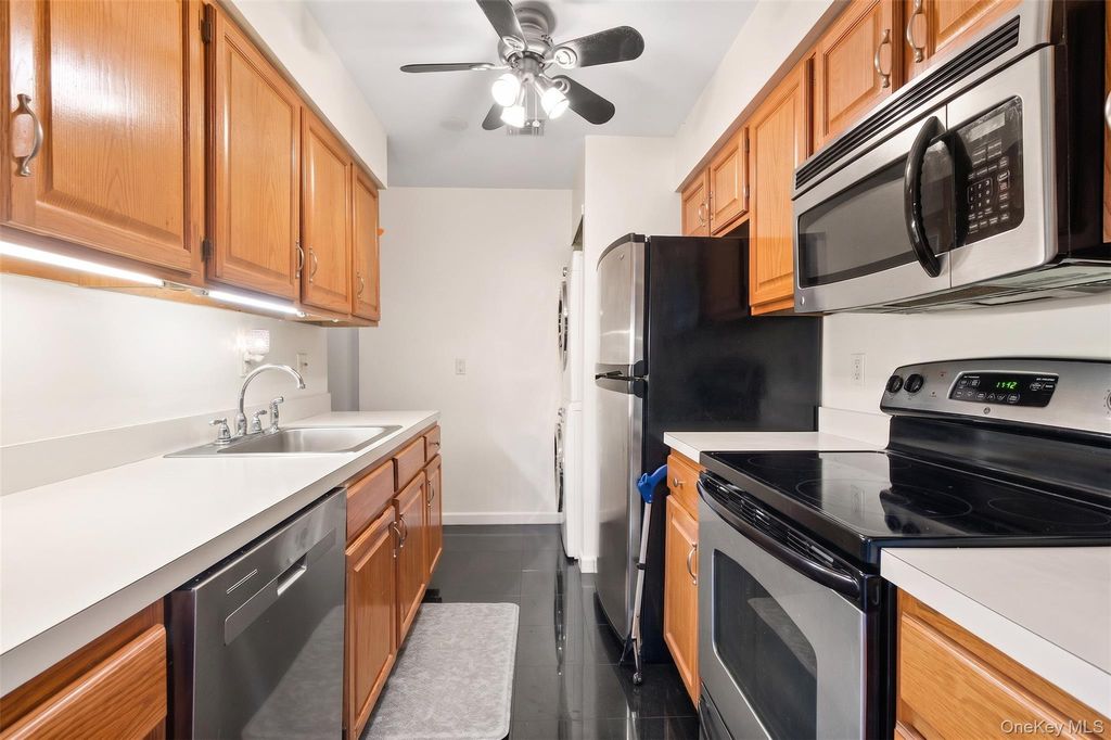 Photo of 78 Cambridge Drive W, Copiague, NY 11726 (MLS # 913978)