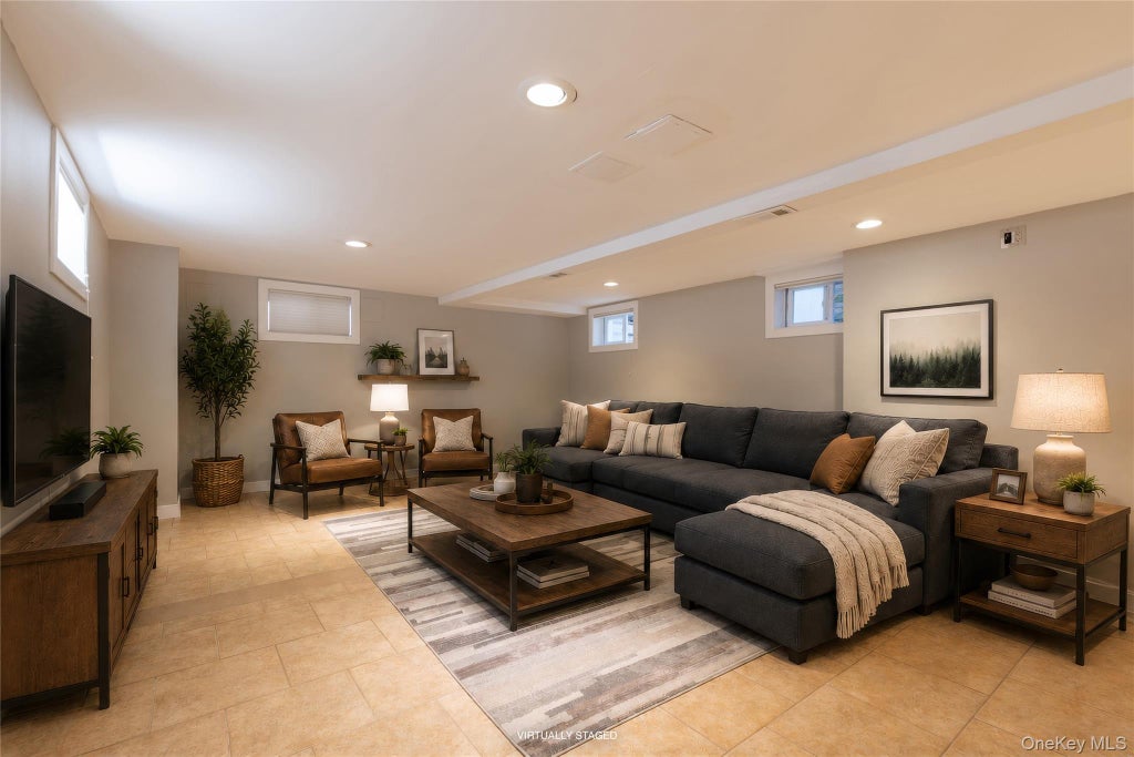 Photo of 191 Beach 140th Street, Rockaway Park, NY 11694 (MLS # 1034677)