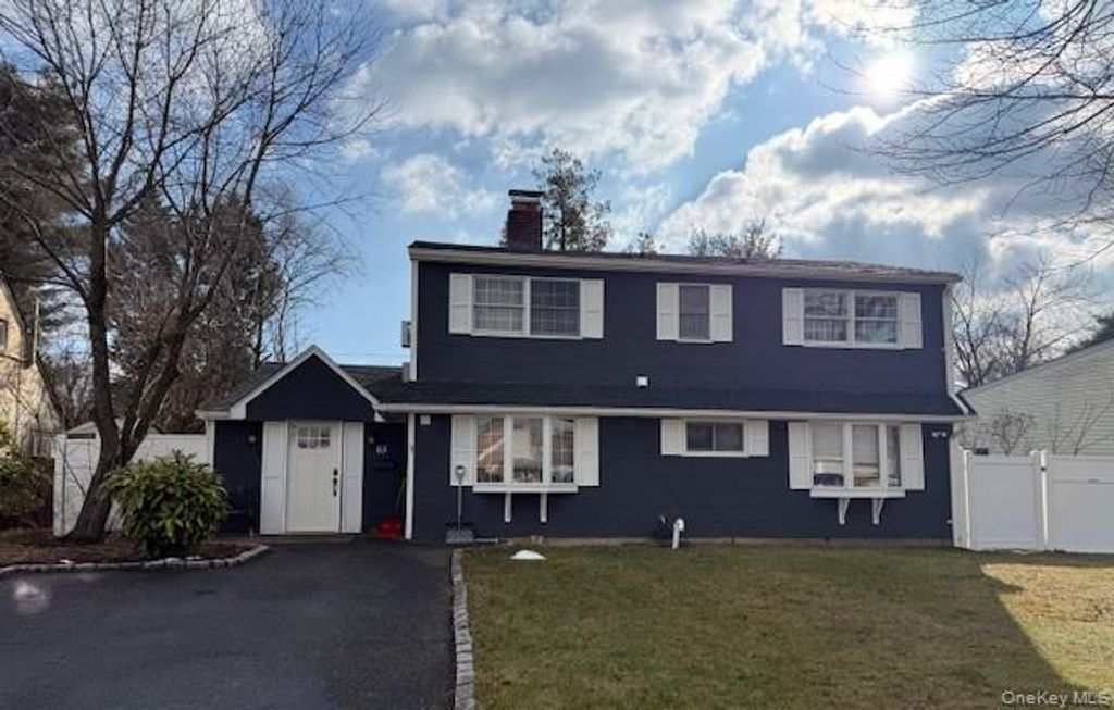 Photo of 65 Prince Lane, Westbury, NY 11590 (MLS # 949579)