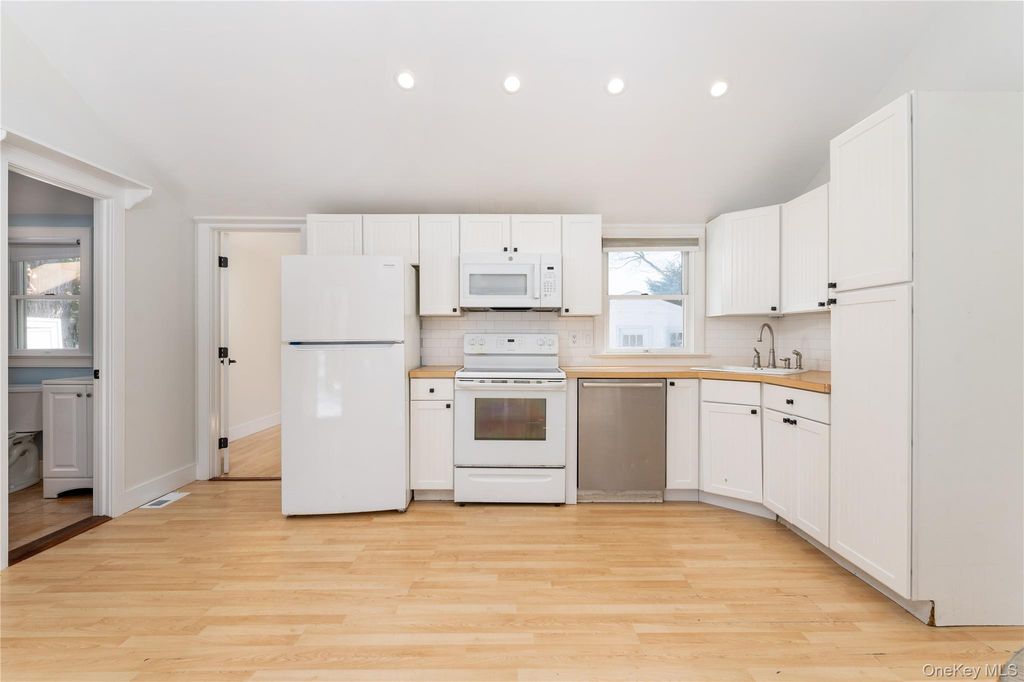 Photo of 5 Sherman Avenue, Hampton Bays, NY 11946 (MLS # 972253)