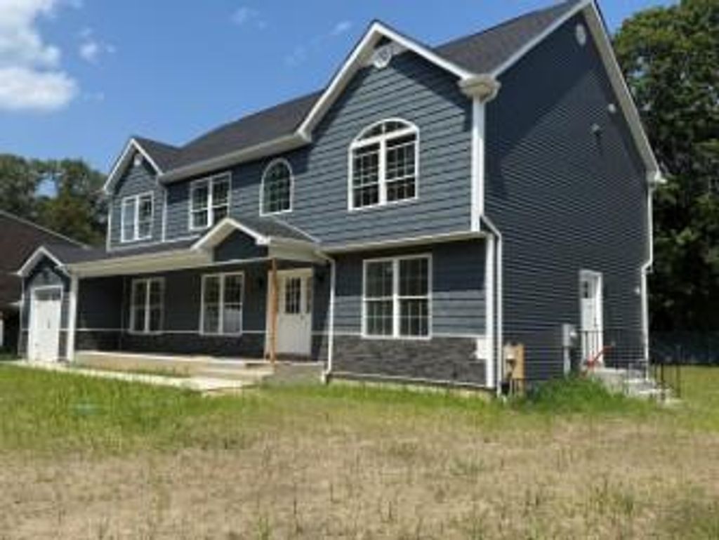 Photo of 155 Calebs Path, Brentwood, NY 11717 (MLS # 896536)