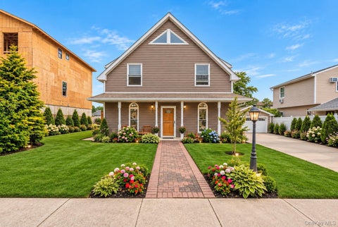 Photo of 547 Sunnybrook Drive, Oceanside, NY 11572 (MLS # 1048688)