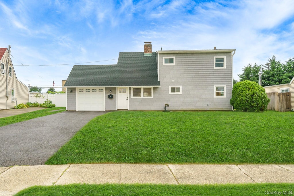 Photo of 12 Squirrel Lane, Levittown, NY 11756 (MLS # 1049029)