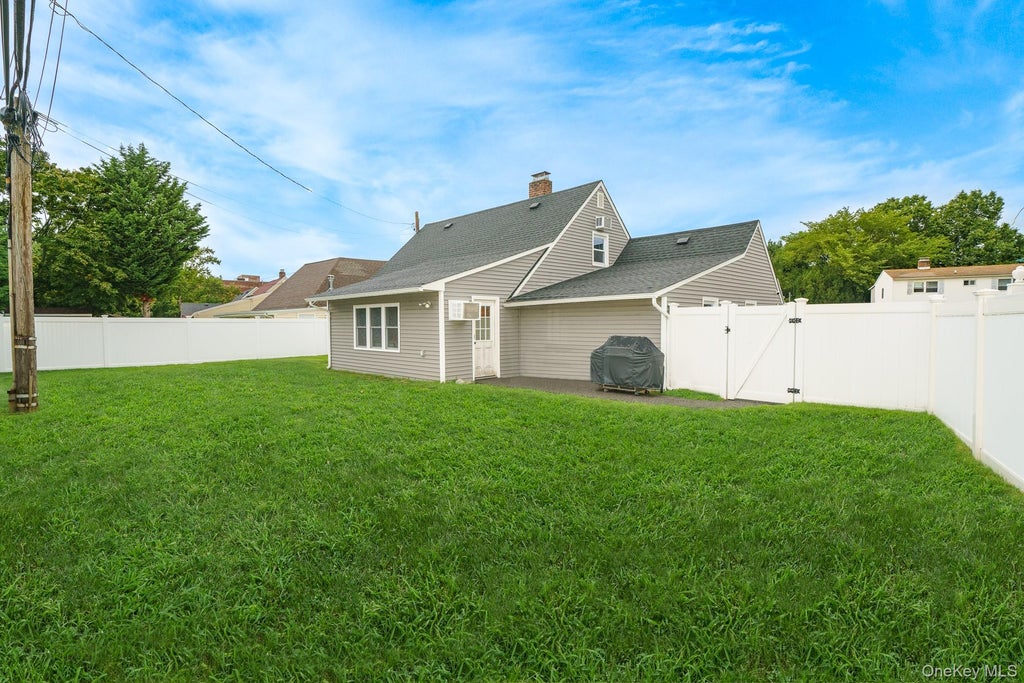 Photo of 12 Squirrel Lane, Levittown, NY 11756 (MLS # 1049029)