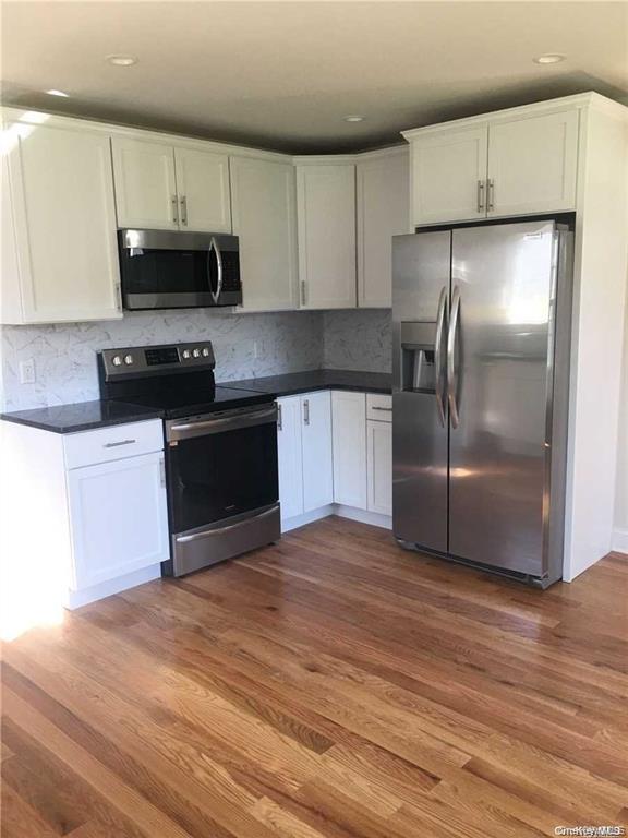 Photo of 25 Osage Street, Selden, NY 11784 (MLS # 1066719)