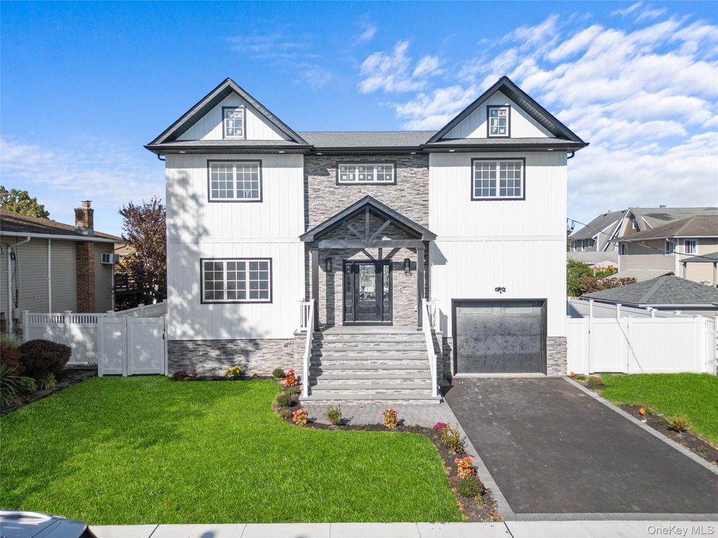 Photo of 450 Morea Street, Oceanside, NY 11572 (MLS # 916488)