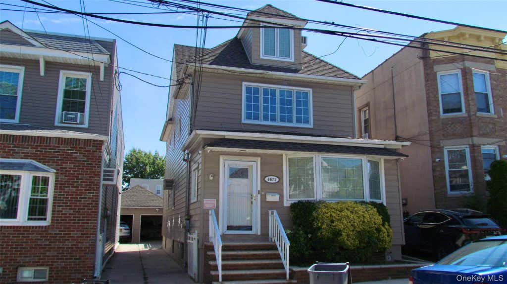 Photo of 66-71 74th Street, Middle Village, NY 11379 (MLS # 1028847)