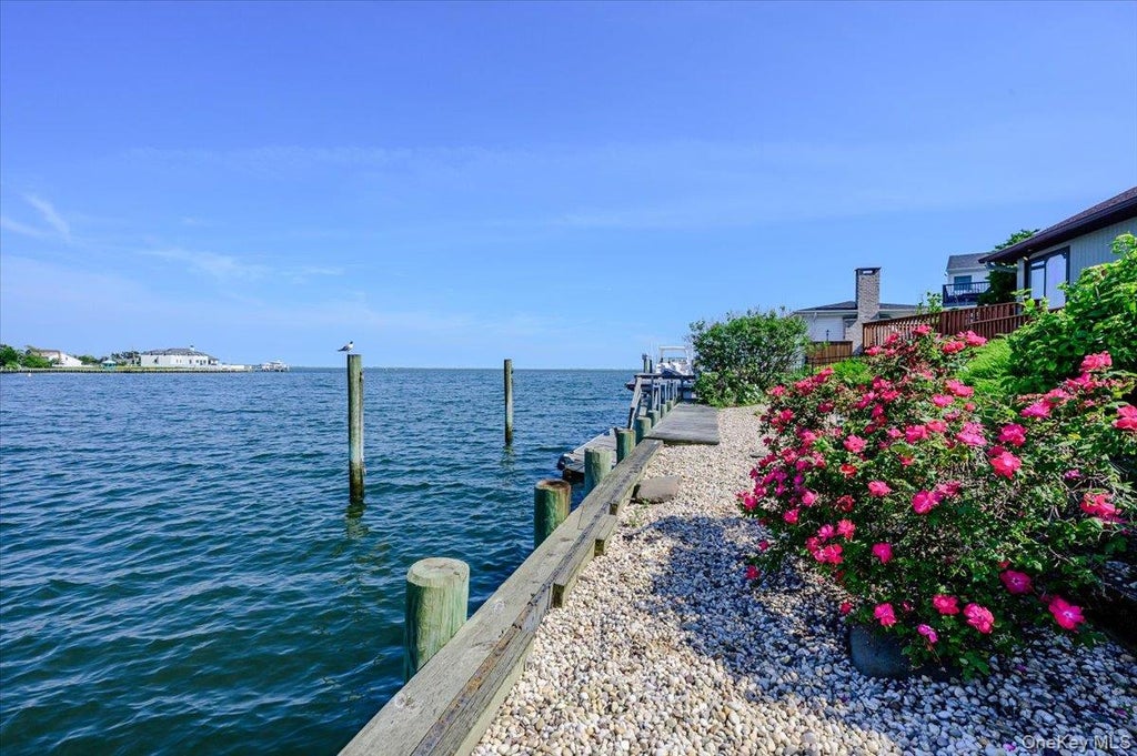 Photo of 248 Harbor Lane, Massapequa Park, NY 11762 (MLS # 1012801)