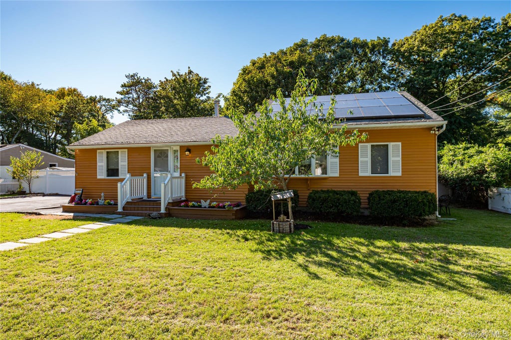 Photo of 8 Forest Avenue, Medford, NY 11763 (MLS # 1046942)