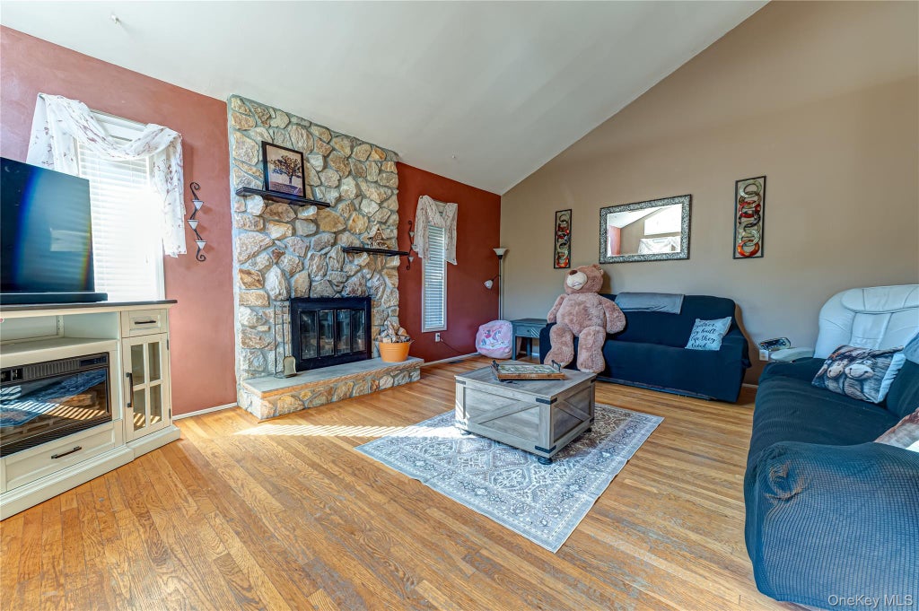 Photo of 8 Forest Avenue, Medford, NY 11763 (MLS # 1046942)